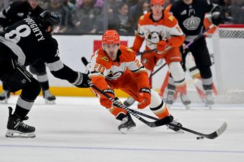 Dec 27, 2025; Los Angeles, California, USA;  Anaheim Ducks left wing Chris Kreider (20) defends a shot on goal by Los Angeles Kings defenseman Drew Doughty (8) in the third period at Crypto.com Arena. Mandatory Credit: Jayne Kamin-Oncea-Imagn Images