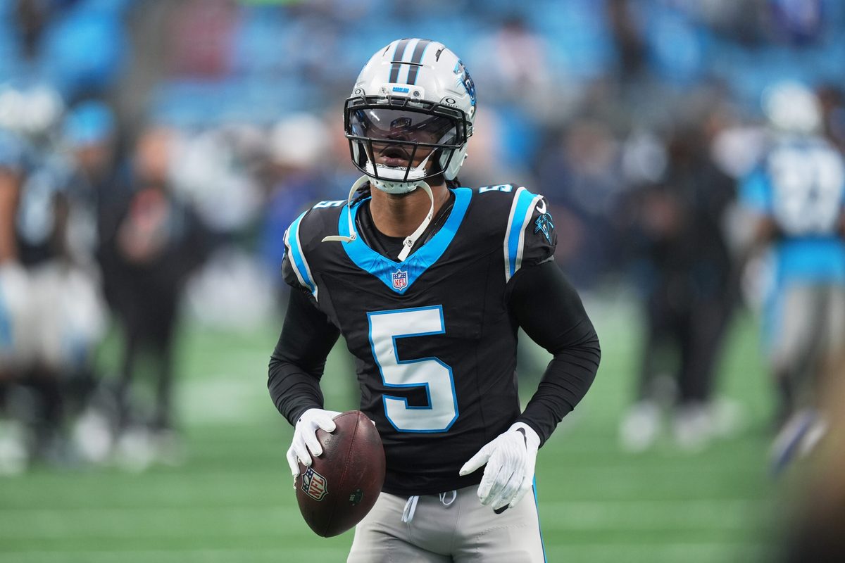 Dec 28, 2025; Charlotte, North Carolina, USA; Carolina Panthers running back Rico Dowdle (5) warms up before the game against the Seattle Seahawks at Bank of America Stadium. Mandatory Credit: Jim Dedmon-Imagn Images