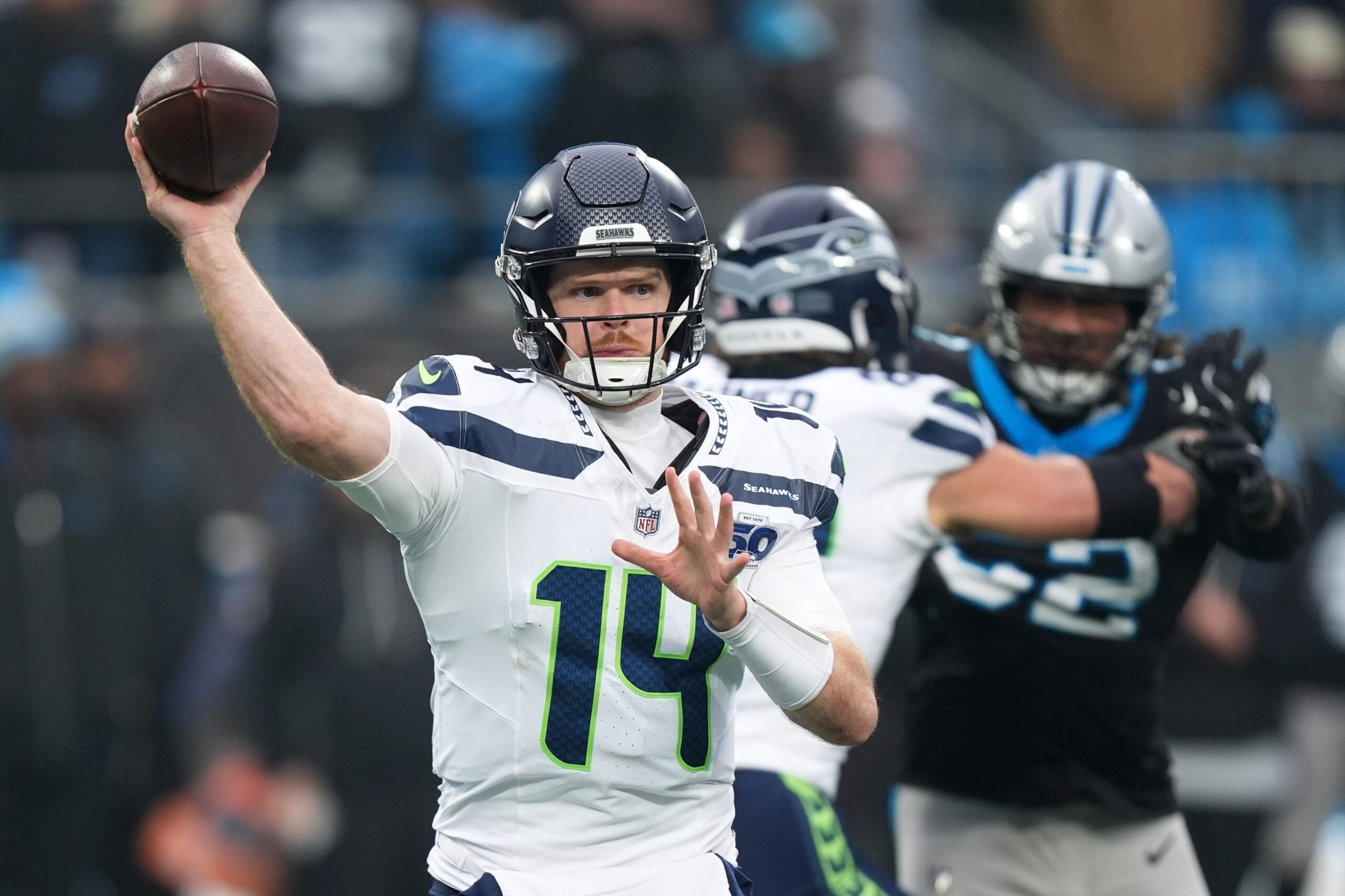 Dec 28, 2025; Charlotte, North Carolina, USA; Seattle Seahawks quarterback Sam Darnold (14) throws a pass against the Carolina Panthers during the fourth quarter at Bank of America Stadium. Mandatory Credit: Jim Dedmon-Imagn Images