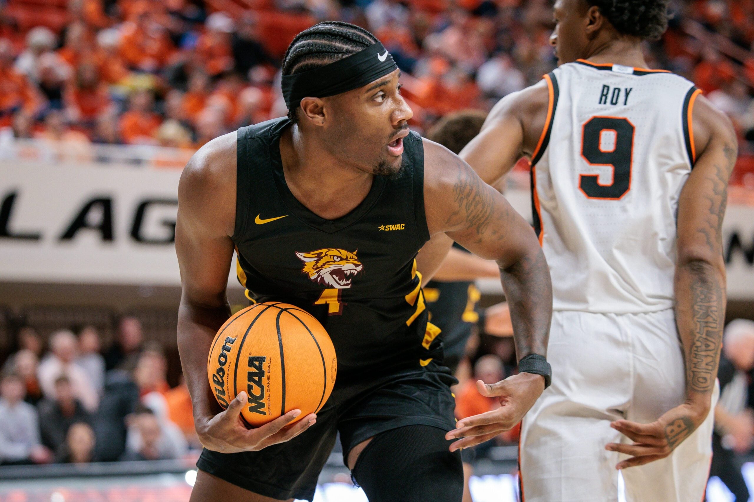Dec 29, 2025; Stillwater, Oklahoma, USA;  Bethune-Cookman Wildcats player Ariel Bland rebounds during the first half against the Oklahoma State Cowboys at Gallagher-Iba Arena. Mandatory Credit: William Purnell-Imagn Images