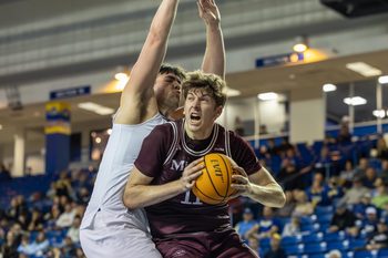 Missouri State Forward Keith Palek III (11) drives to the basket against Delaware Hens guard Justyn Fernandez (4) at The Bob Carpenter Center on Dec. 29, 2025.