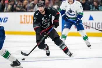 Dec 29, 2025; Seattle, Washington, USA; Seattle Kraken forward Jordan Eberle (7) skates with the puck during the third period against the Vancouver Canucks at Climate Pledge Arena. Mandatory Credit: Stephen Brashear-Imagn Images