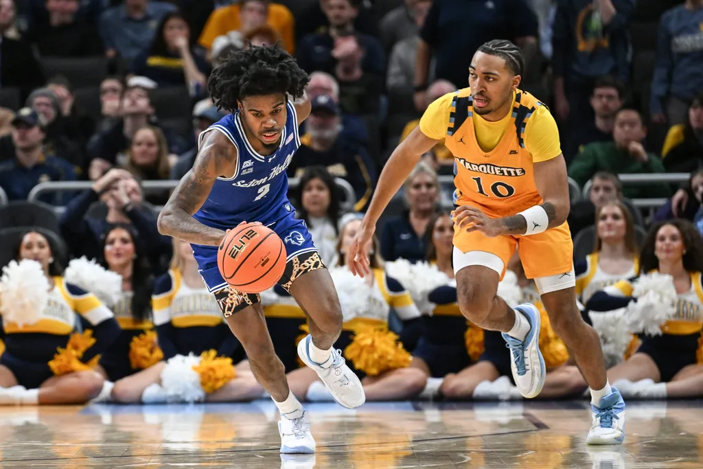 Seton Hall guard Tajuan Simpkins (2) steals the ball from Marquette guard Adrien Stevens (10) in the second half of a game Tuesday, December 30, 2025, at Fiserv Forum in Milwaukee, Wisconsin. Seton Hall won, 79-73.