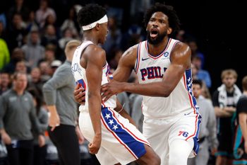 Dec 30, 2025; Memphis, Tennessee, USA; Philadelphia 76ers center Joel Embiid (21) reacts with guard VJ Edgecombe (77) after scoring a game winning three during overtime against the Memphis Grizzlies at FedExForum. Mandatory Credit: Petre Thomas-Imagn Images