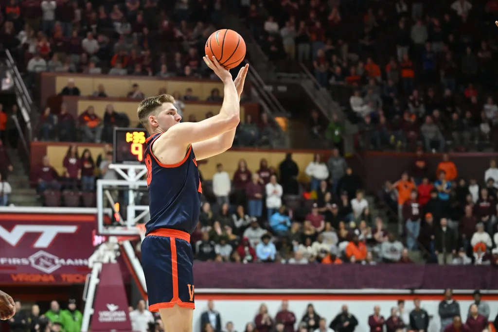 Dec 31, 2025; Blacksburg, Virginia, USA; Virginia Cavaliers forward Thijs de Ridder (28) shoots a shot during the third overtime at Cassell Coliseum. Mandatory Credit: Brian Bishop-Imagn Images