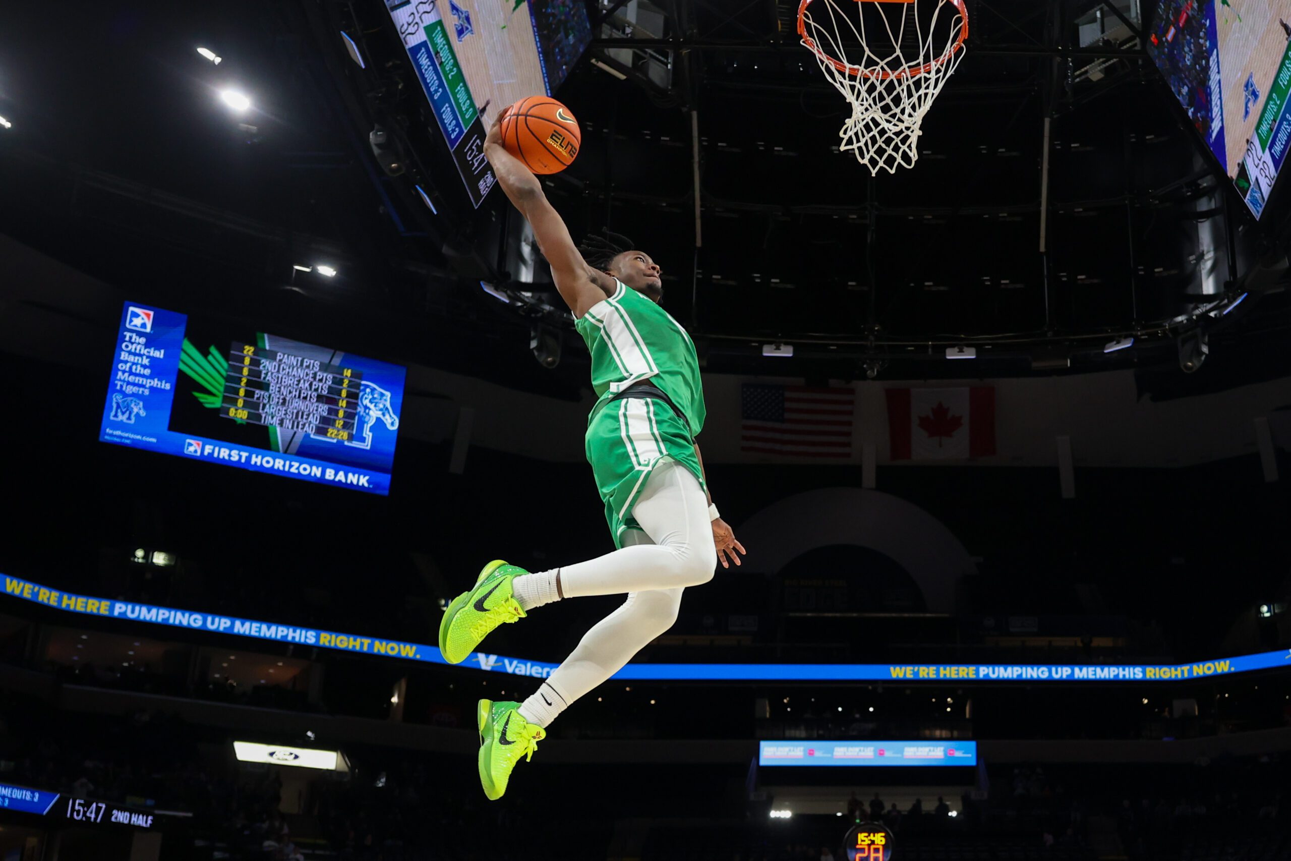 Dec 31, 2025; Memphis, Tennessee, USA; North Texas Mean Green guard David Terrell Jr. (5) dunks the ball against the Memphis Tigers during the second half at FedExForum. Mandatory Credit: Wesley Hale-Imagn Images