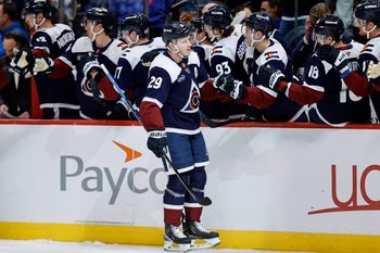 Dec 31, 2025; Denver, Colorado, USA; Colorado Avalanche center Nathan MacKinnon (29) celebrates with the bench after his second goal in the first period against the St. Louis Blues at Ball Arena. Mandatory Credit: Isaiah J. Downing-Imagn Images