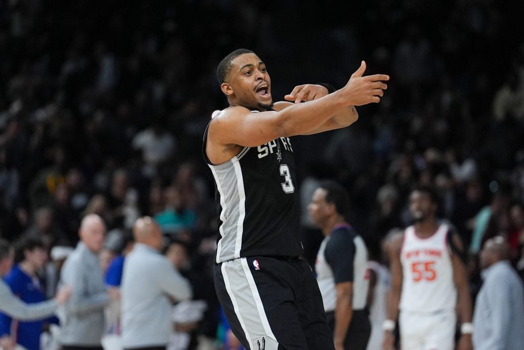 Dec 31, 2025; San Antonio, Texas, USA; San Antonio Spurs forward Keldon Johnson (3) celebrates in the second half against the New York Knicks at Frost Bank Center. Mandatory Credit: Daniel Dunn-Imagn Images