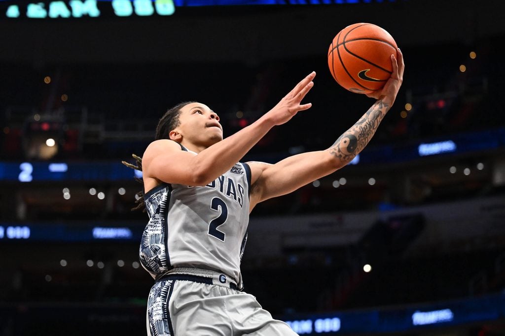 Dec 31, 2025; Washington, District of Columbia, USA; Georgetown Hoyas guard Malik Mack (2) shoots against the St. John's Red Storm during the second half at Capital One Arena. Mandatory Credit: Brad Mills-Imagn Images