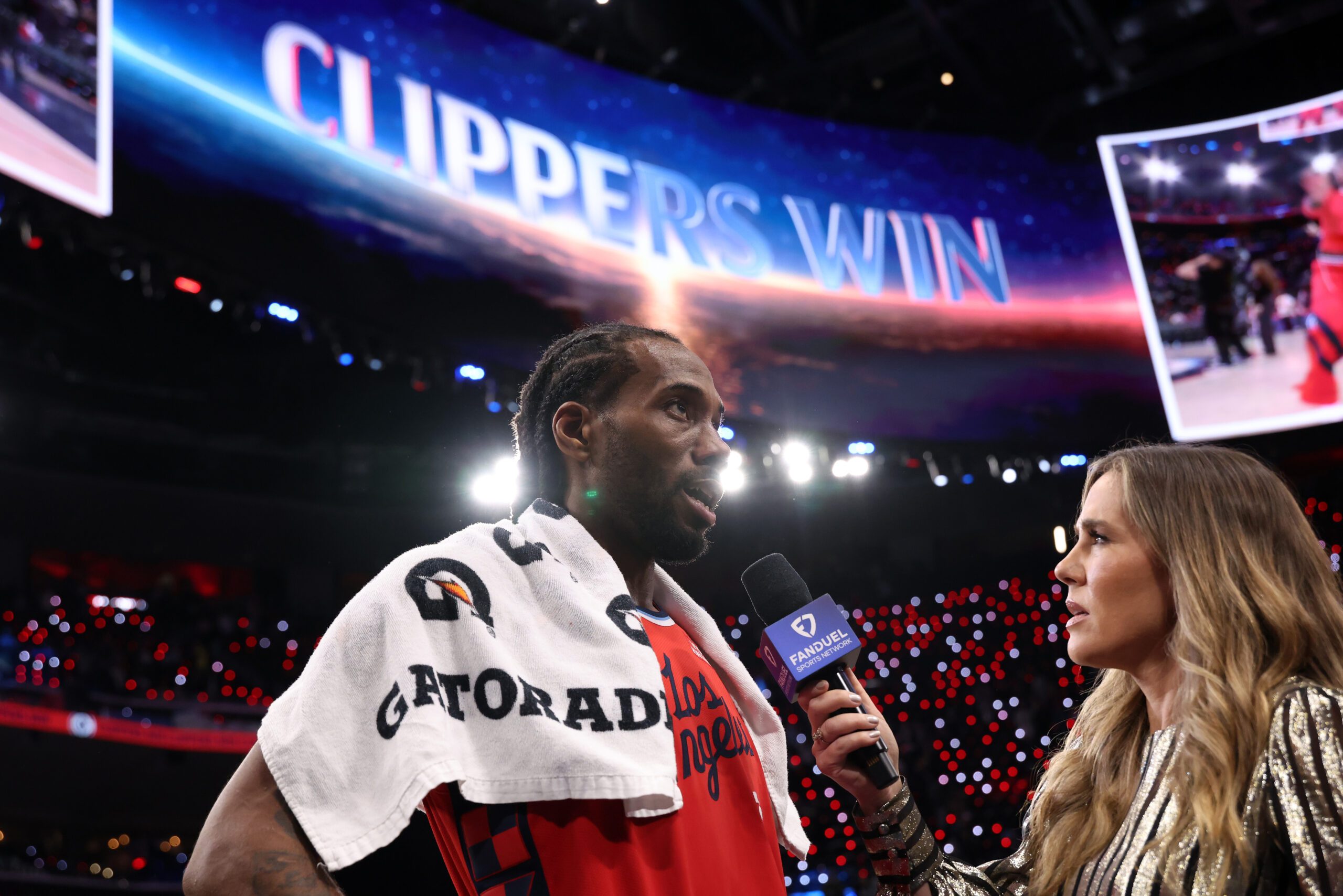Jan 1, 2026; Inglewood, California, USA;  Los Angeles Clippers forward Kawhi Leonard (2) takes a post game interview after defeating the Utah Jazz 118-101 at Intuit Dome. Mandatory Credit: Kiyoshi Mio-Imagn Images