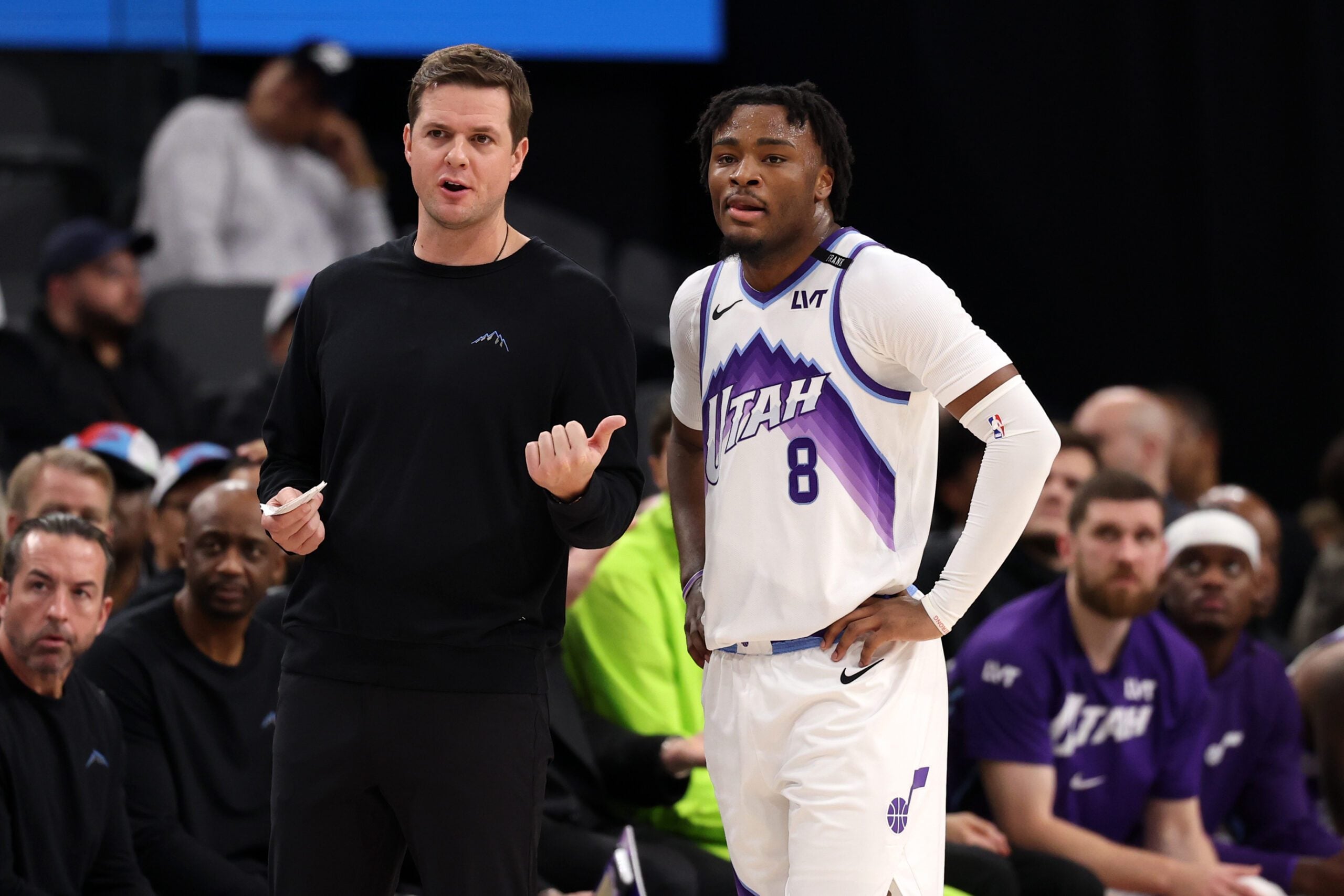 Jan 1, 2026; Inglewood, California, USA;  Utah Jazz Head Coach Will Hardy (left) talks with guard Isaiah Collier (8) during the first half against the Los Angeles Clippers at Intuit Dome. Mandatory Credit: Kiyoshi Mio-Imagn Images