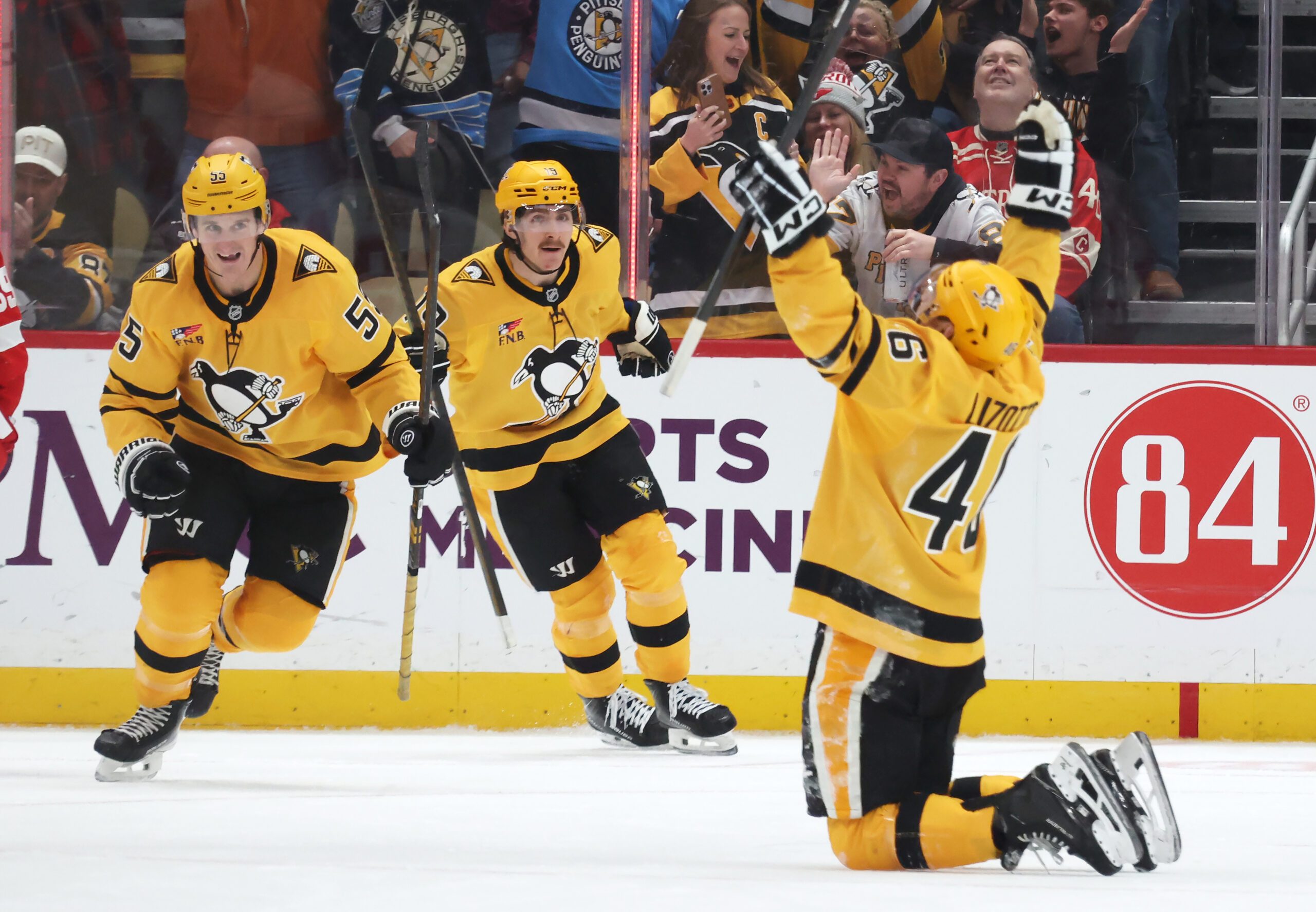 Jan 1, 2026; Pittsburgh, Pennsylvania, USA;  Pittsburgh Penguins center Noel Acciari (55) and center Connor Dewar (19) react to a goal by center Blake Lizotte (46) during the third period against the Detroit Red Wings at PPG Paints Arena. Mandatory Credit: Charles LeClaire-Imagn Images