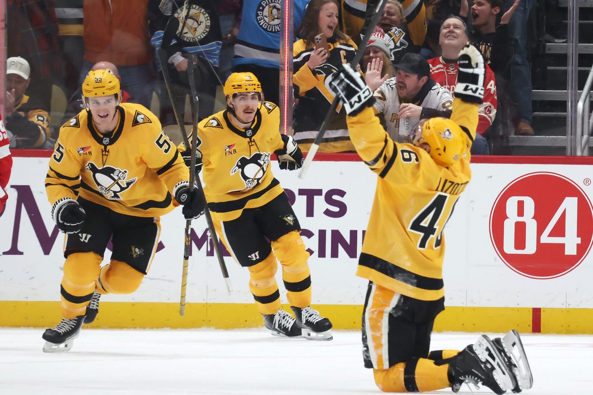 Jan 1, 2026; Pittsburgh, Pennsylvania, USA;  Pittsburgh Penguins center Noel Acciari (55) and center Connor Dewar (19) react to a goal by center Blake Lizotte (46) during the third period against the Detroit Red Wings at PPG Paints Arena. Mandatory Credit: Charles LeClaire-Imagn Images