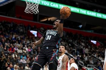 Jan 1, 2026; Detroit, Michigan, USA; Detroit Pistons guard Javonte Green (31) shoots the ball against the Miami Heat in the second quarter at Little Caesars Arena. Mandatory Credit: Lon Horwedel-Imagn Images