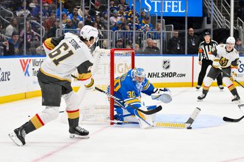 Jan 2, 2026; St. Louis, Missouri, USA; St. Louis Blues goaltender Joel Hofer (30) defends the net against Vegas Golden Knights right wing Mark Stone (61) during the first period at Enterprise Center. Mandatory Credit: Jeff Curry-Imagn Images