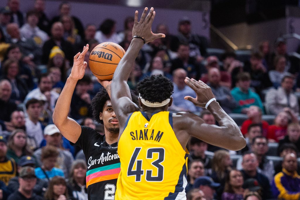 Jan 2, 2026; Indianapolis, Indiana, USA; San Antonio Spurs guard Dylan Harper (2) shoots the ball while Indiana Pacers forward Pascal Siakam (43) defends in the second half at Gainbridge Fieldhouse. Mandatory Credit: Trevor Ruszkowski-Imagn Images