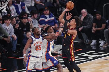 Jan 2, 2026; New York, New York, USA;  Atlanta Hawks forward Jalen Johnson (1) shoots past New York Knicks center Ariel Hukporti (55) and forward Og Anunoby (8) in the first quarter at Madison Square Garden. Mandatory Credit: Wendell Cruz-Imagn Images