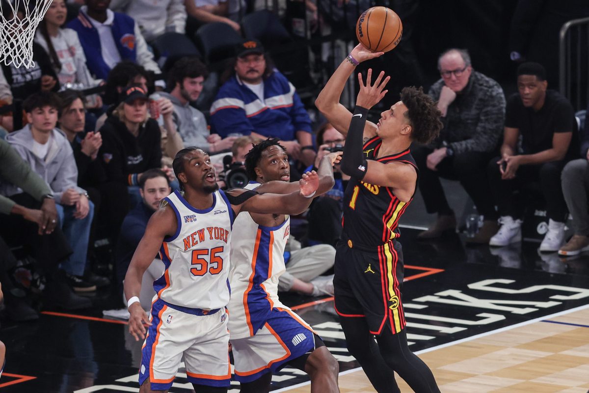 Jan 2, 2026; New York, New York, USA; Atlanta Hawks forward Jalen Johnson (1) shoots past New York Knicks center Ariel Hukporti (55) and forward Og Anunoby (8) in the first quarter at Madison Square Garden. Mandatory Credit: Wendell Cruz-Imagn Images
