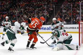 Jan 2, 2026; Anaheim, California, USA;  Anaheim Ducks right wing Beckett Sennecke (45) shoots the puck against Minnesota Wild goaltender Filip Gustavsson (32) during the second period at Honda Center. Mandatory Credit: Kiyoshi Mio-Imagn Images