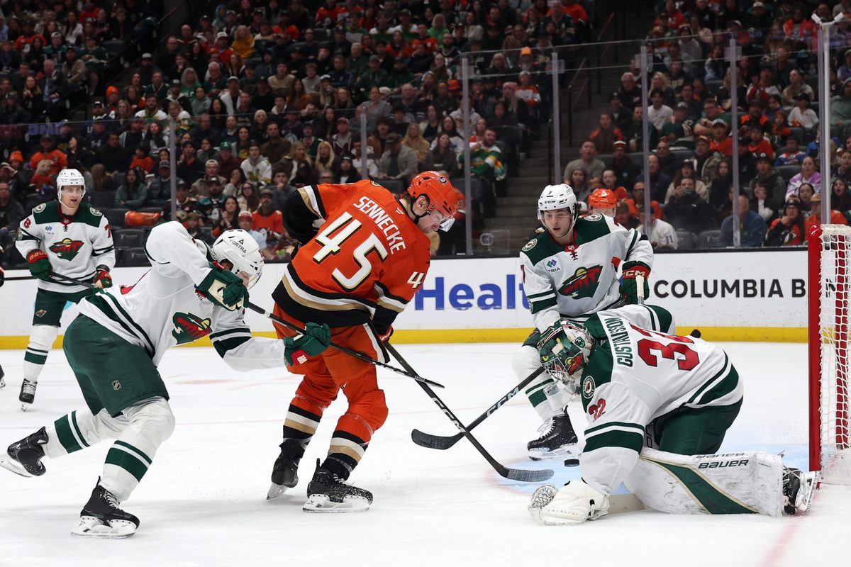 Jan 2, 2026; Anaheim, California, USA; Anaheim Ducks right wing Beckett Sennecke (45) shoots the puck against Minnesota Wild goaltender Filip Gustavsson (32) during the second period at Honda Center. Mandatory Credit: Kiyoshi Mio-Imagn Images