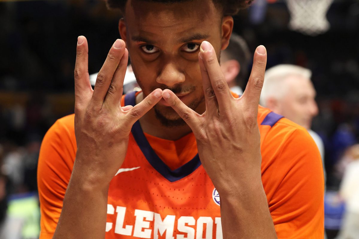 Jan 3, 2026; Pittsburgh, Pennsylvania, USA; Clemson Tigers guard Efrem Johnson (4) reacts after defeating the Pittsburgh Panthers at the Petersen Events Center. Mandatory Credit: Charles LeClaire-Imagn Images