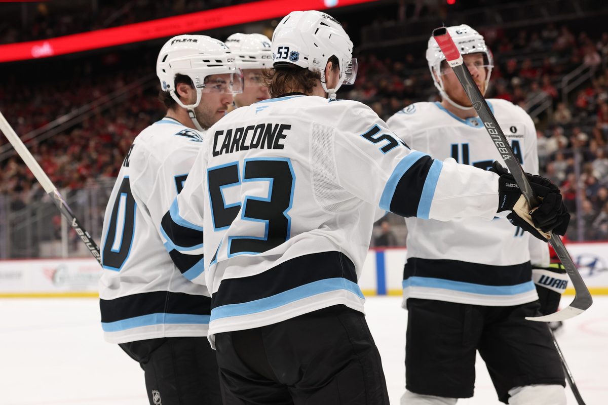 Jan 3, 2026; Newark, New Jersey, USA; Utah Mammoth left wing Michael Carcone (53) celebrates his goal against the New Jersey Devils during the third period at Prudential Center. Mandatory Credit: Ed Mulholland-Imagn Images