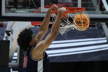Jan 3, 2026; Salt Lake City, Utah, USA; Arizona Wildcats forward Koa Peat (10) dunks the ball against the Utah Utes during the second half at Jon M. Huntsman Center. Mandatory Credit: Rob Gray-Imagn Images