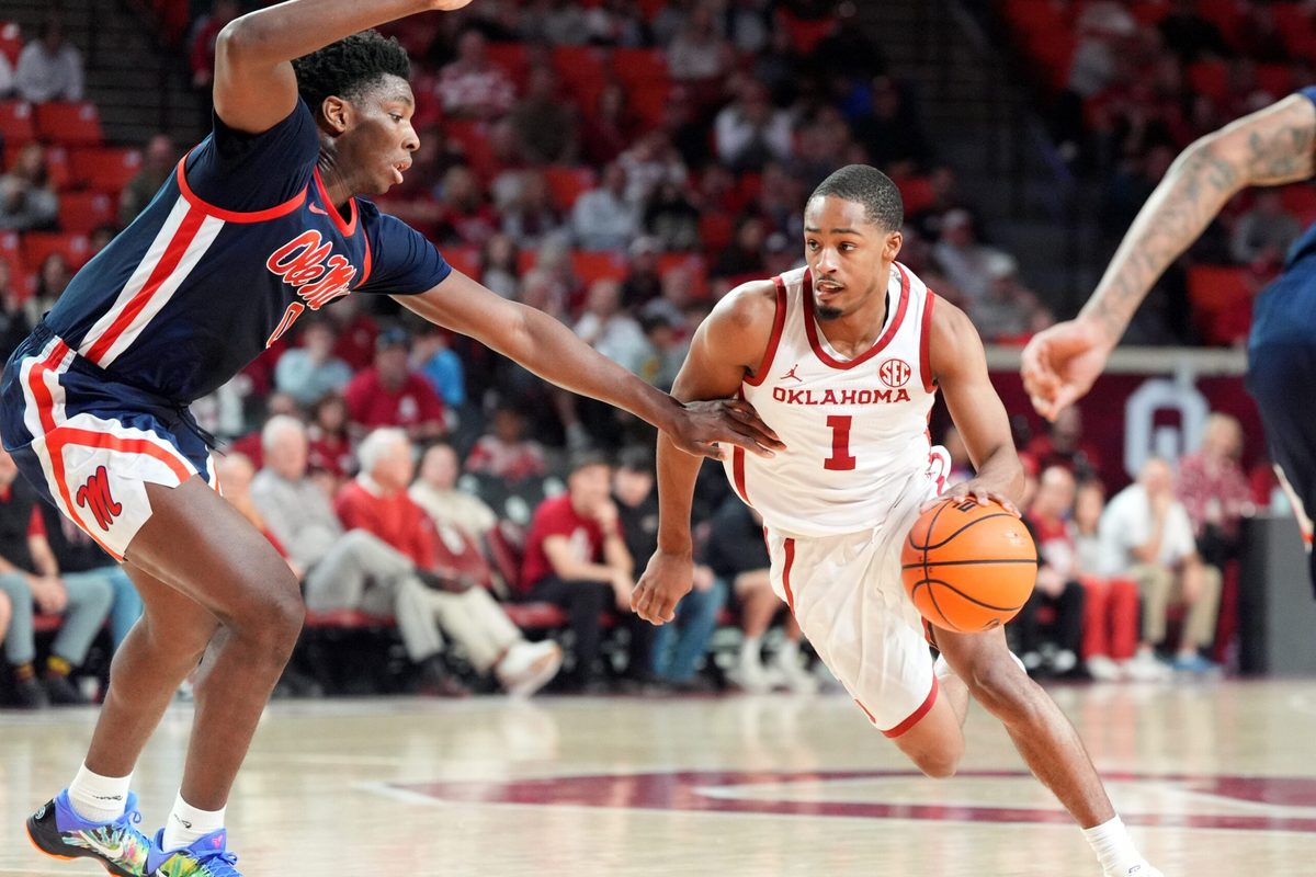 Oklahoma's Xzayvier Brown (1) drives up court as Ole Miss' Malik Dia (0) defends in the second half of the menÕs college basketball game between the University of Oklahoma Sooners and Ole Miss at Lloyd Noble Center in Norman, Okla., Saturday Jan. 3, 2026.