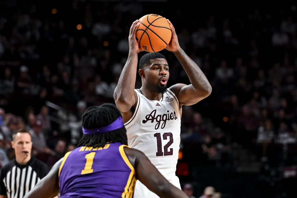 Jan 3, 2026; College Station, Texas, USA; Texas A&M Aggies forward Rashaun Agee (12) looks to pass the ball against the Louisiana State Tigers at Reed Arena. Mandatory Credit: Maria Lysaker-Imagn Images