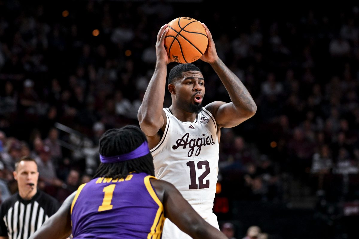 Jan 3, 2026; College Station, Texas, USA; Texas A&M Aggies forward Rashaun Agee (12) looks to pass the ball against the Louisiana State Tigers at Reed Arena. Mandatory Credit: Maria Lysaker-Imagn Images