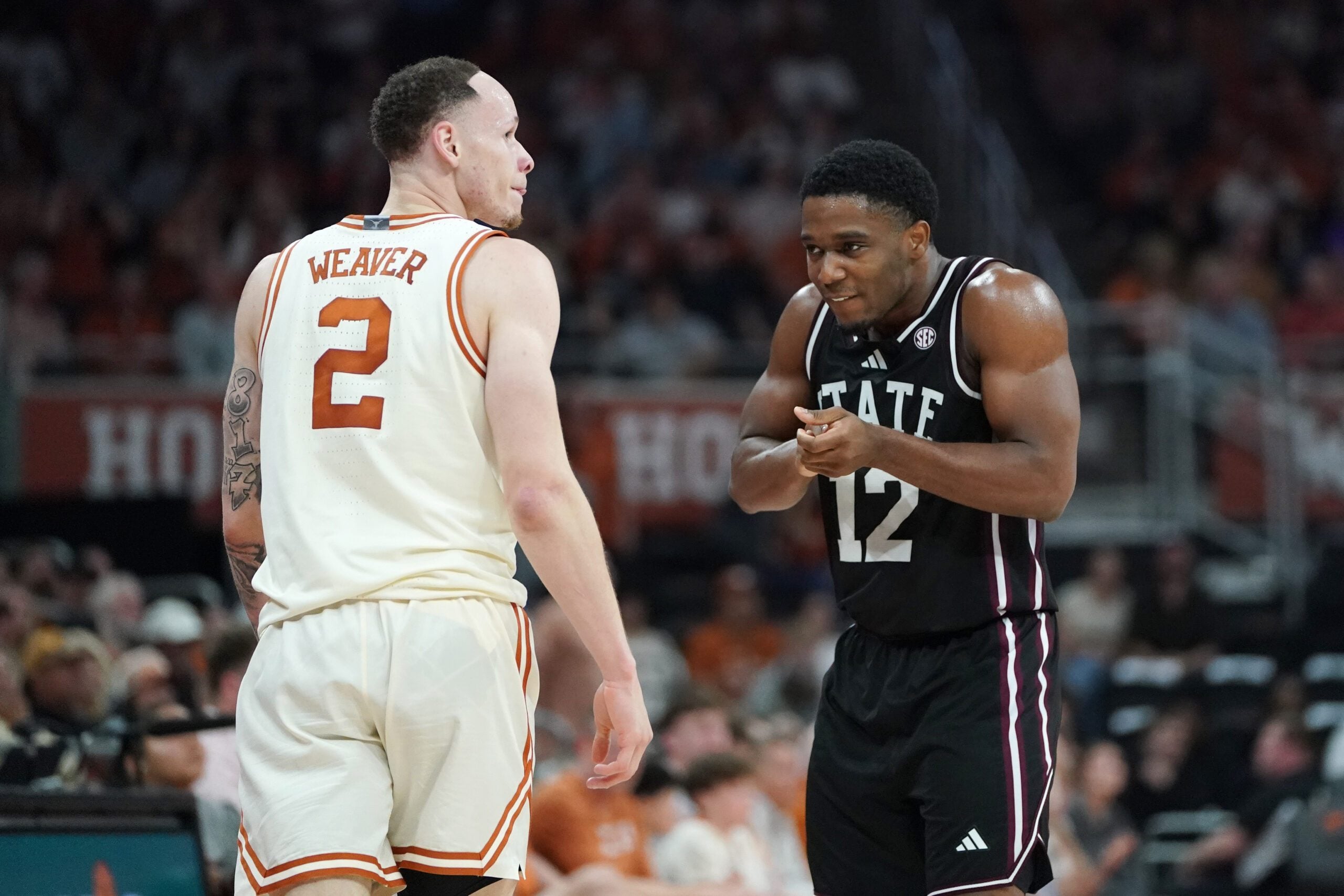 Jan 3, 2026; Austin, Texas, USA; Mississippi State Bulldogs guard Josh Hubbard (12) reacts to a basket  as Texas Longhorns guard Chendall Weaver (2) looks on during the second half at Moody Center. Mandatory Credit: Dustin Safranek-Imagn Images