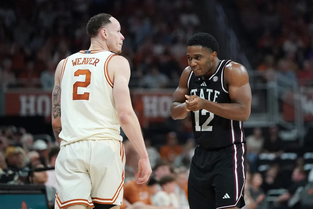 Jan 3, 2026; Austin, Texas, USA; Mississippi State Bulldogs guard Josh Hubbard (12) reacts to a basket as Texas Longhorns guard Chendall Weaver (2) looks on during the second half at Moody Center. Mandatory Credit: Dustin Safranek-Imagn Images