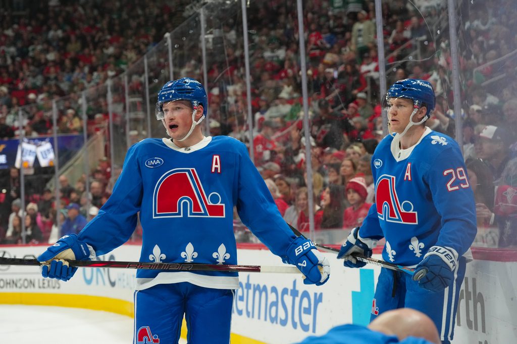 Jan 3, 2026; Raleigh, North Carolina, USA; Colorado Avalanche defenseman Cale Makar (8) and center Nathan MacKinnon (29) look on during the third period against the Carolina Hurricanes at Lenovo Center. Mandatory Credit: James Guillory-Imagn Images