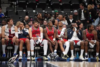Jan 3, 2026; Inglewood, California, USA; LA Clippers players watch from the bench in the fourth quarter against the Boston Celtics at the Intuit Dome. Mandatory Credit: Kirby Lee-Imagn Images
