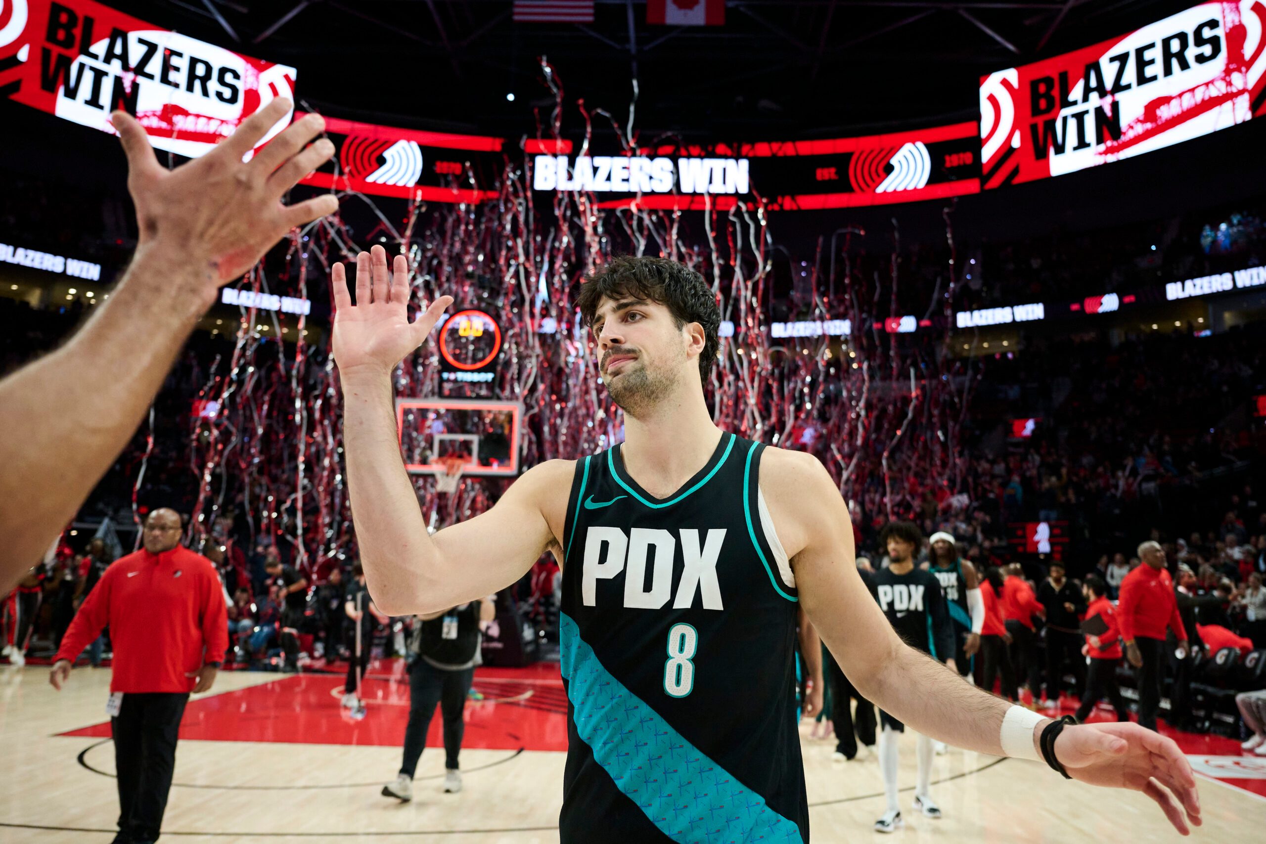 Jan 5, 2026; Portland, Oregon, USA; Portland Trail Blazers forward Deni Avdija (8) celebrates a win over the Utah Jazz at Moda Center. Mandatory Credit: Troy Wayrynen-Imagn Images