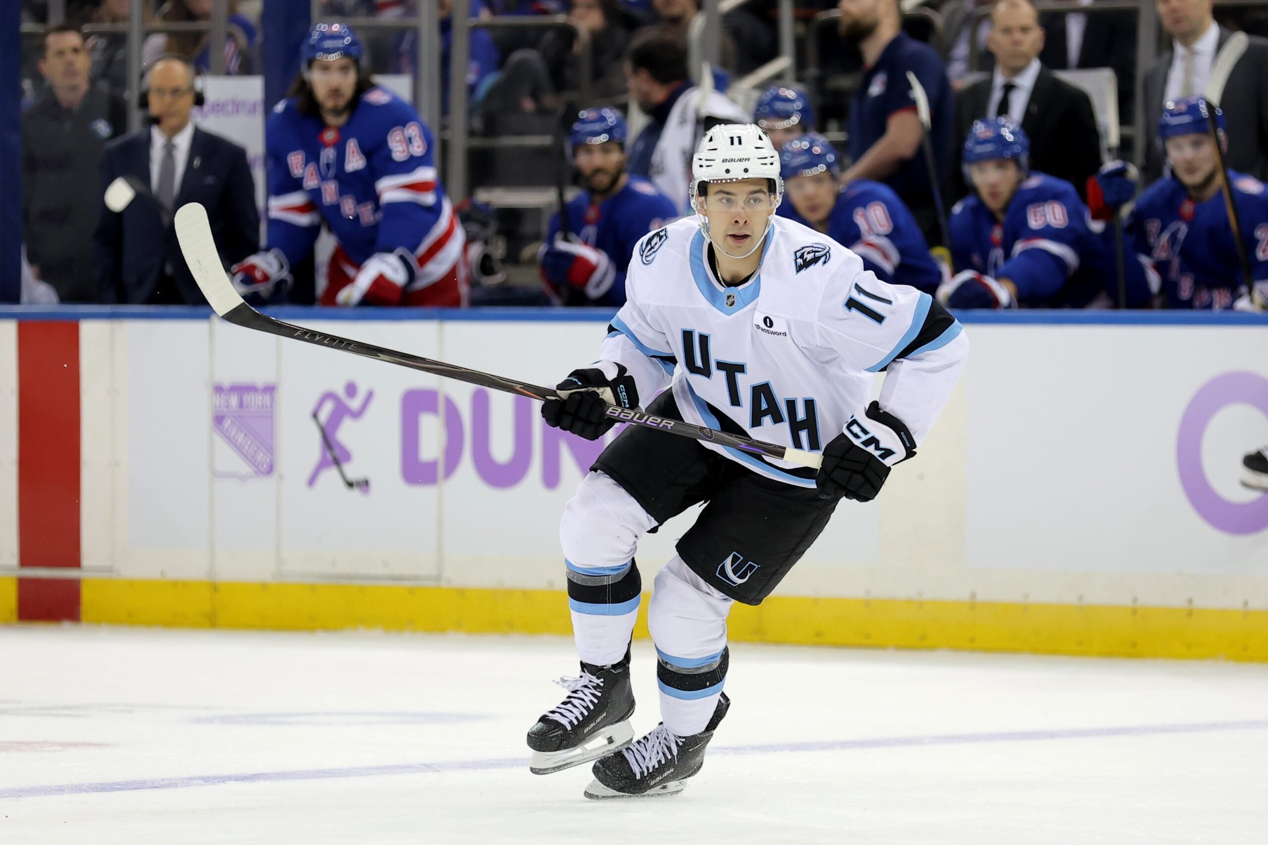 Jan 5, 2026; New York, New York, USA; Utah Mammoth right wing Dylan Guenther (11) skates against the New York Rangers during the first period at Madison Square Garden. Mandatory Credit: Brad Penner-Imagn Images
