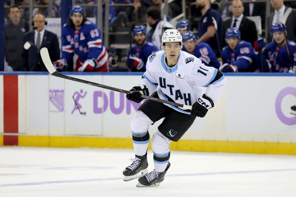 Jan 5, 2026; New York, New York, USA; Utah Mammoth right wing Dylan Guenther (11) skates against the New York Rangers during the first period at Madison Square Garden. Mandatory Credit: Brad Penner-Imagn Images