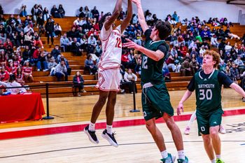 New Bedford's Samajae Ivy hits the baseline shot as New Bedford more then double up Dartmouth 89-44 at home on Monday, January 5th.