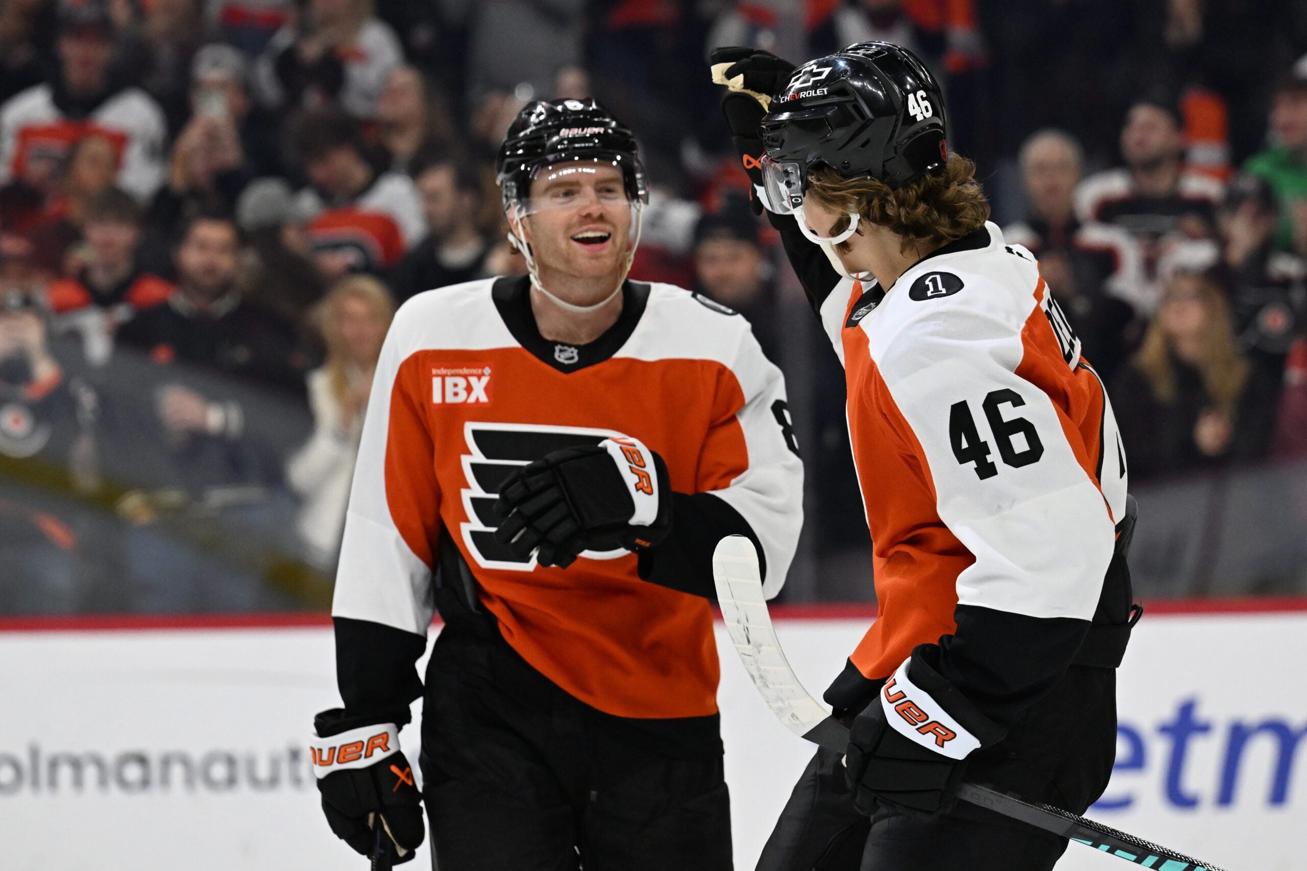 Jan 6, 2026; Philadelphia, Pennsylvania, USA; Philadelphia Flyers center Trevor Zegras (46) celebrates his goal with defenseman Cam York (8) against the Anaheim Ducks during the first period at Xfinity Mobile Arena. Mandatory Credit: Eric Hartline-Imagn Images
