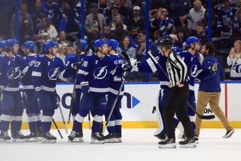 Jan 6, 2026; Tampa, Florida, USA; Tampa Bay Lightning left wing Brandon Hagel (38) and teammates celebrate after they beat the Colorado Avalanche during the third period at Benchmark International Arena. Mandatory Credit: Kim Klement Neitzel-Imagn Images