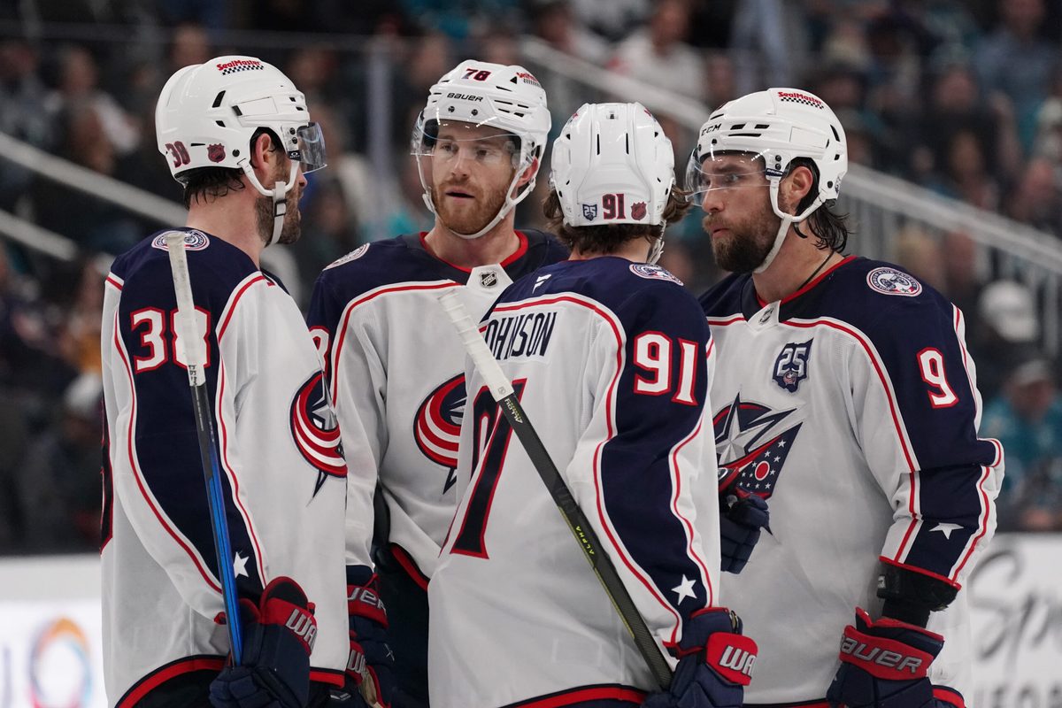 Jan 6, 2026; San Jose, California, USA; Columbus Blue Jackets center Boone Jenner (38), defenseman Damon Severson (78), center Kent Johnson (91), and defenseman Ivan Provorov (9) talk during a break in the action against the San Jose Sharks in the third period at SAP Center at San Jose. Mandatory Credit: David Gonzales-Imagn Images