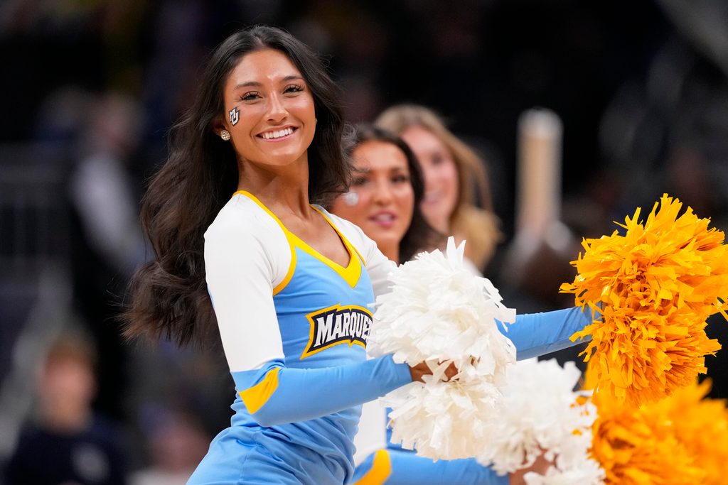Jan 7, 2026; Milwaukee, Wisconsin, USA; Marquette Golden Eagles cheerleaders peform during the second half against the Xavier Musketeers at Fiserv Forum. Mandatory Credit: Jeff Hanisch-Imagn Images
