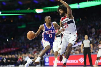 Jan 7, 2026; Philadelphia, Pennsylvania, USA; Philadelphia 76ers guard Tyrese Maxey (0) dribbles the ball against Washington Wizards forward Marvin Bagley III (35) during the third quarter at Xfinity Mobile Arena. Mandatory Credit: Bill Streicher-Imagn Images