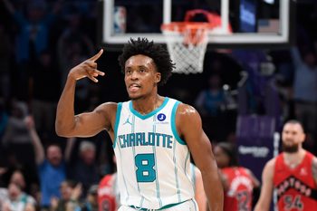 Jan 7, 2026; Charlotte, North Carolina, USA;  Charlotte Hornets guard Collin Sexton (8) reacts after scoring during the second half against the Toronto Raptors at the Spectrum Center. Mandatory Credit: Sam Sharpe-Imagn Images