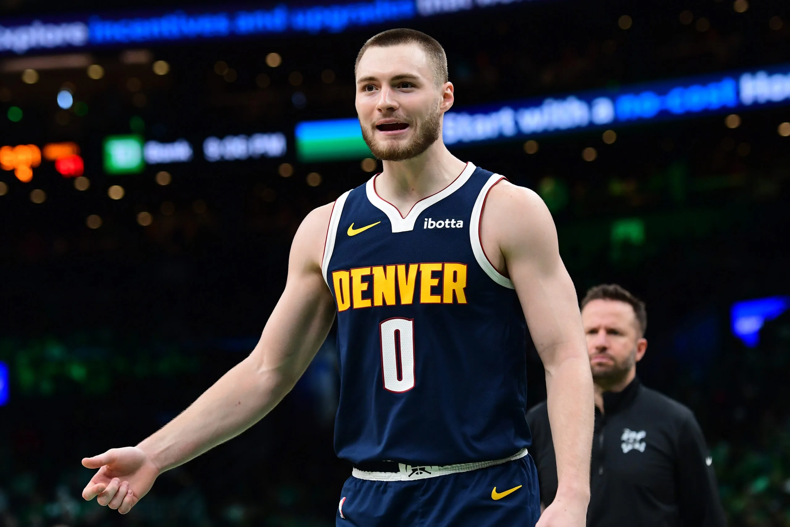 Jan 7, 2026; Boston, Massachusetts, USA; Denver Nuggets guard Christian Braun (0) reacts after a play during the second half against the Boston Celtics at TD Garden. Mandatory Credit: Bob DeChiara-Imagn Images