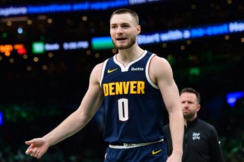 Jan 7, 2026; Boston, Massachusetts, USA; Denver Nuggets guard Christian Braun (0) reacts after a play during the second half against the Boston Celtics at TD Garden. Mandatory Credit: Bob DeChiara-Imagn Images