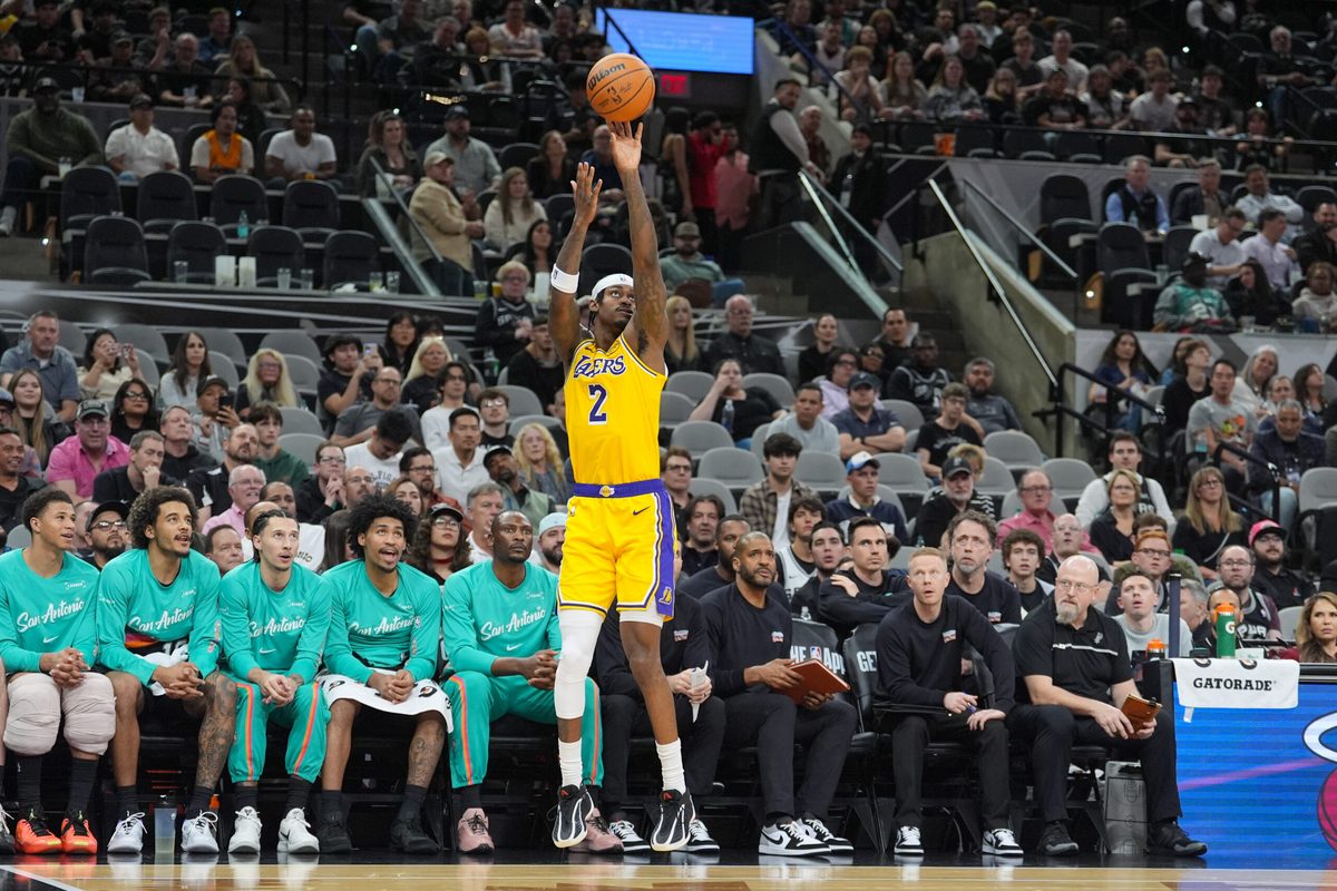Jan 7, 2026; San Antonio, Texas, USA; Los Angeles Lakers forward Jarred Vanderbilt (2) shoots in front of the San Antonio Spurs’ bench in the second half at Frost Bank Center. Mandatory Credit: Daniel Dunn-Imagn Images