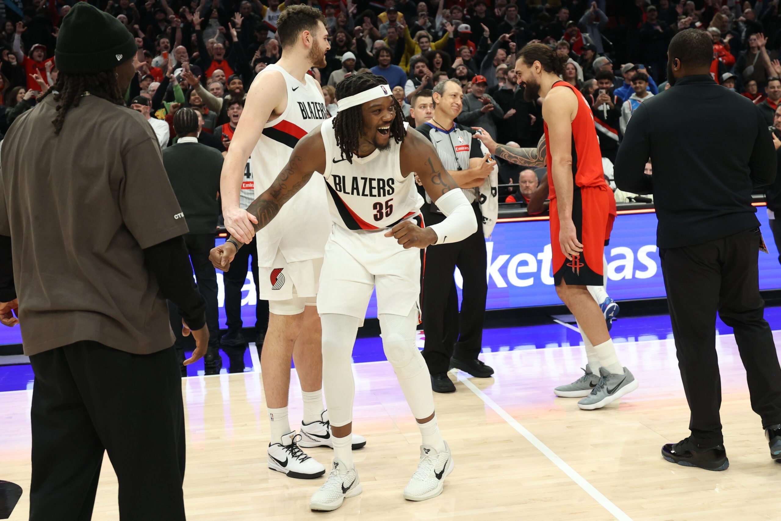 Jan 7, 2026; Portland, Oregon, USA;  Portland Trail Blazers center/forward Robert Williams III (35) celebrates after it was determined that Houston Rockets’ last second shot did not count because time expired and the Trail Blazers sealed a 103-102 win at Moda Center. Mandatory Credit: Jaime Valdez-Imagn Images