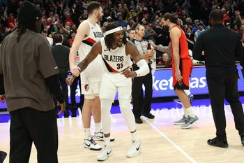 Jan 7, 2026; Portland, Oregon, USA;  Portland Trail Blazers center/forward Robert Williams III (35) celebrates after it was determined that Houston Rockets’ last second shot did not count because time expired and the Trail Blazers sealed a 103-102 win at Moda Center. Mandatory Credit: Jaime Valdez-Imagn Images