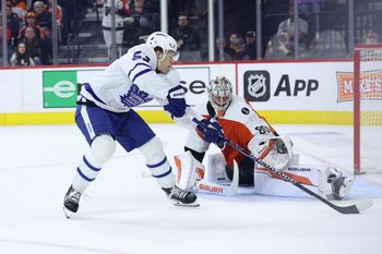Jan 8, 2026; Philadelphia, Pennsylvania, USA; Philadelphia Flyers goaltender Dan Vladar (80) makes a save on Toronto Maple Leafs right wing Easton Cowan (53) during overtime at Xfinity Mobile Arena. Mandatory Credit: Bill Streicher-Imagn Images